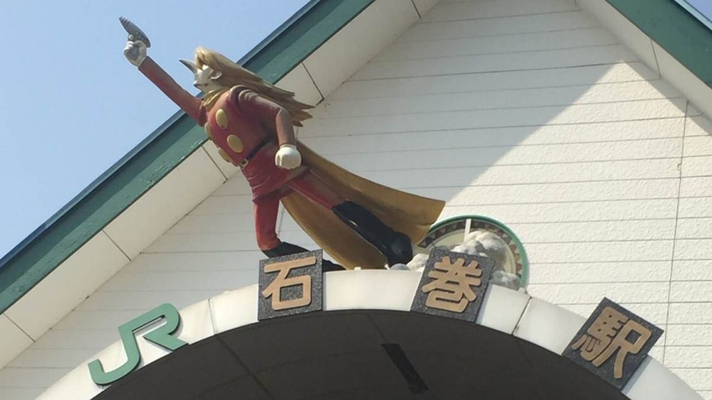 JR石巻駅の看板のうえにあるジェット・リンクの像（サイボーグ009のキャラクター）